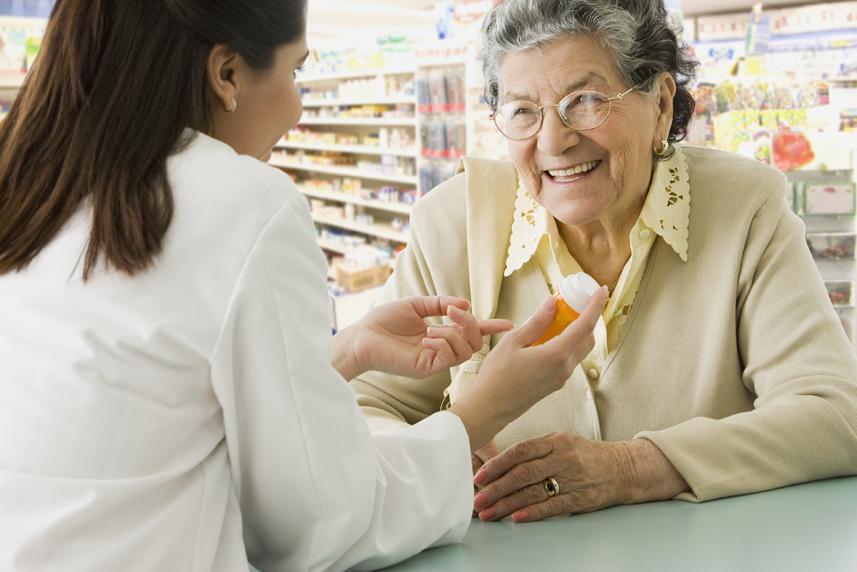 Woman speaking to a pharmacist
