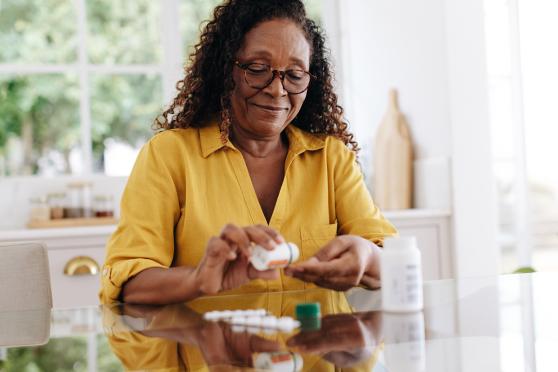 Woman going through her medication